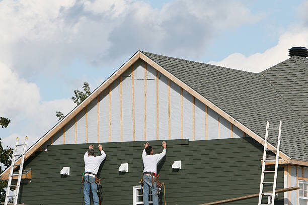 Professional Siding Installation technician working in Bowling Green, OH
